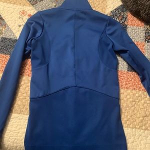 Nike half zip with zippered pockets